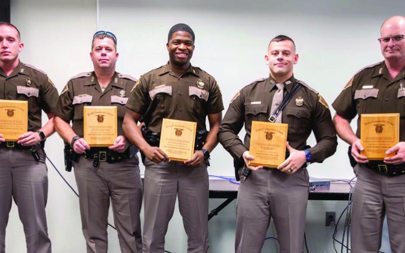 Awards were presented last week to Troop E troopers of the Oklahoma Highway Patrol. From left, Brycen Collins, Darrell Wo_ord, Sedrick Frierson, Seth Leyba and Rocky Green. Matt Swearengin | Durant Democrat