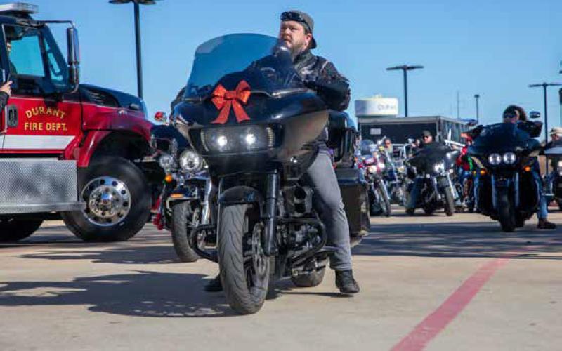 Will Otts rides in the Okie Toy Run that raises money for Toys for Tots.