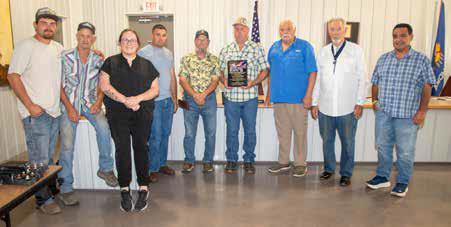Caddo has been designated a Purple Heart Town and a plaque was presented during a council meeting last week. Shown are council members Garrett Schafer, Eddie Ervin and Abby Owen, Dwight Gould, Curtis Cheramie, Mayor Lindal White, Daniel Earley, Yates Canipe and Steve Byrd. Matt Swearengin | Durant Democrat