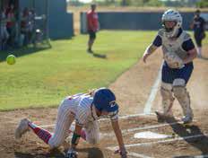 Lady Lion Anslee Morse makes it to home plate in the game with Shawnee. Matt Swearengin | Durant Democrat