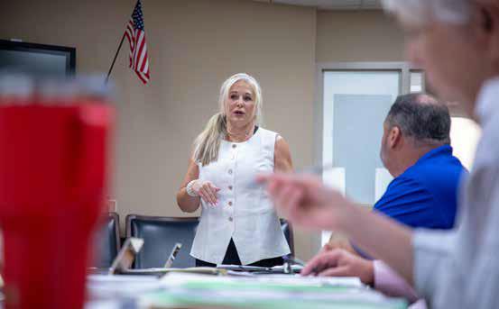 Connie Arneson, Durant site director for Gear Up, spoke to the Durant Board of Education about the program that provides high school students money for college courses. Matt Swearengin | Durant Democrat