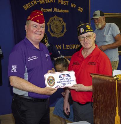 Dan Wylie, national commander for the American Legion, visited Durant Green-Bryant Post 39 last week and he visited with local post commander Hayden Woods, right, and other American Legion members. Matt Swearengin | Durant Democrat