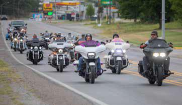 Members of the Three Valley Riders motorcycle club ride to the memorial service for Mike Morris last Saturday at the Southeastern Visual &amp; Performing Arts Center. Matt Swearengin | Durant Democrat