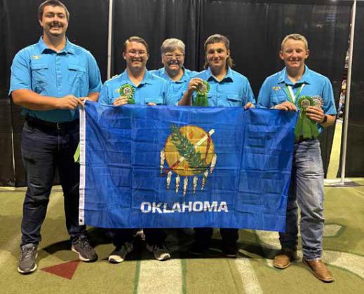 Micheal Murphy, second from right, Bryan County 4, represented Oklahoma at the National 4-H Shooting Sports competition in Recurve Archery. Photo provided