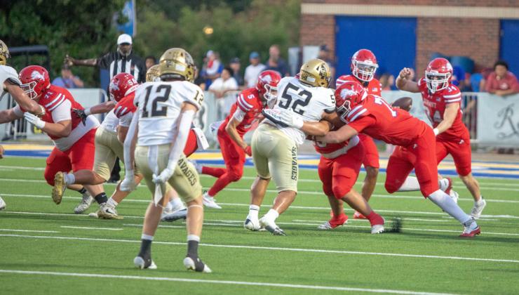 Durant Lions tangle with Broken Bow Savages during a recent game. Matt Swearengin | Durant Democrat