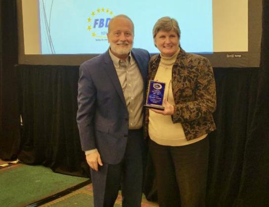 Dr. David Whitlock receives SWCRA Best Educator Award from FBD Executive Director Michelle McEacharn. Photos provided