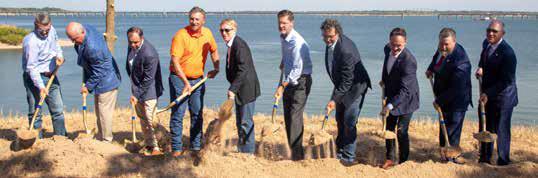 Officials break ground on the Roosevelt Bridge replacement project during a ceremony on Sept. 10 at Lake Texoma in Marshall County. The new bridge is expected to be completed in fall 2029. Matt Swearengin | Durant Democrat