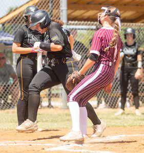 Caddo Lady Bruin Cadie Hull makes it to home plate during the recent Calera Tournament. Matt Swearengin | Durant Democrat