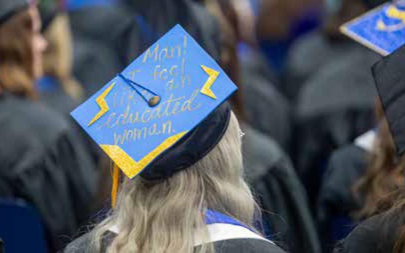 Some of the graduates decorated their mortarboards for commencement Dec. 16 at Southeastern.