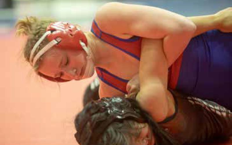 Durant wrester Addison Polk wrestles in a match last week during the dual in Durant.