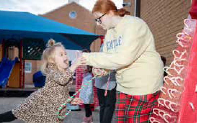 Teagan Effinger reacts during the REL Early Childhood Center Christmas Carnival.
