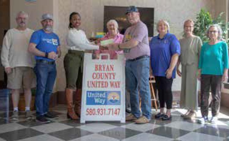 Bryan County United Way presented a $2,500 check to Red River Special Olympics last week. From left, Jay Hess, Buddy Ray Swicker, Danielle Baker, regional engagement director for United Way Worldwide; Pam Robinson, United Way director; Steven Remshardt, Kristie Luke, Marilyn Hitchcock and Cecelia Cacace. Matt Swearengin | Durant Democrat