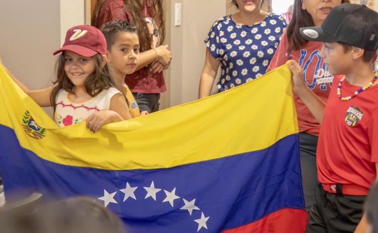 Flags representing different countries were displayed in a parade of flags at the Durant School District’s Hispanic Heritage Month Celebration. Matt Swearengin | Durant Democrat