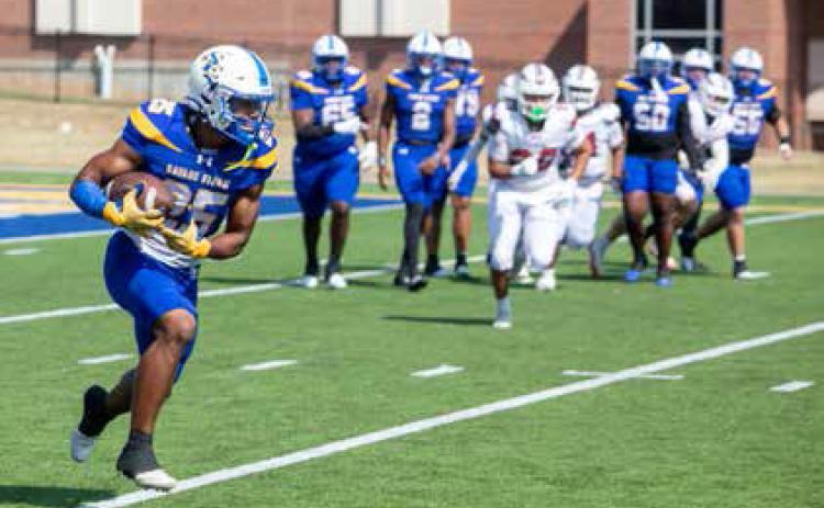 Southeastern football player Braylon Colgrove runs down field in the game with Southern Nazarene. Matt Swearengin | Durant Democrat