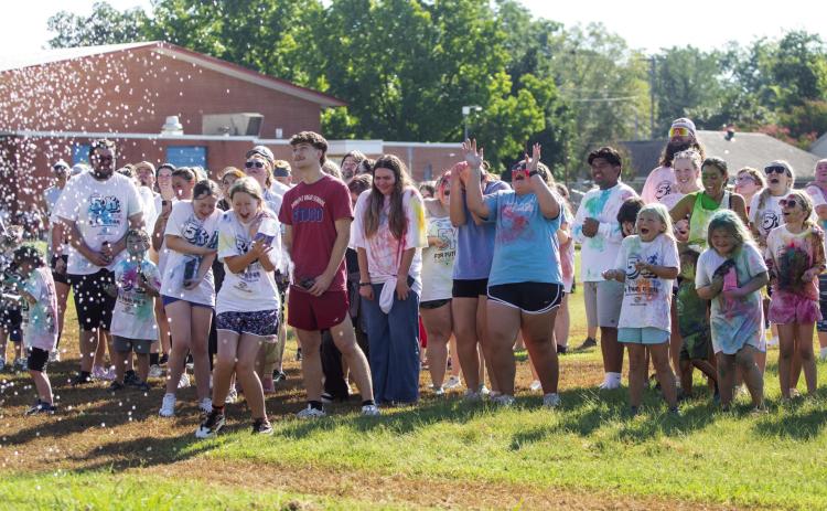 The Durant Fire Department hosed down participants in the Boys &amp; Girls Club 5K for Futures and Color Run last Saturday. Color packets were released during the event. Matt Swearengin | Durant Democrat