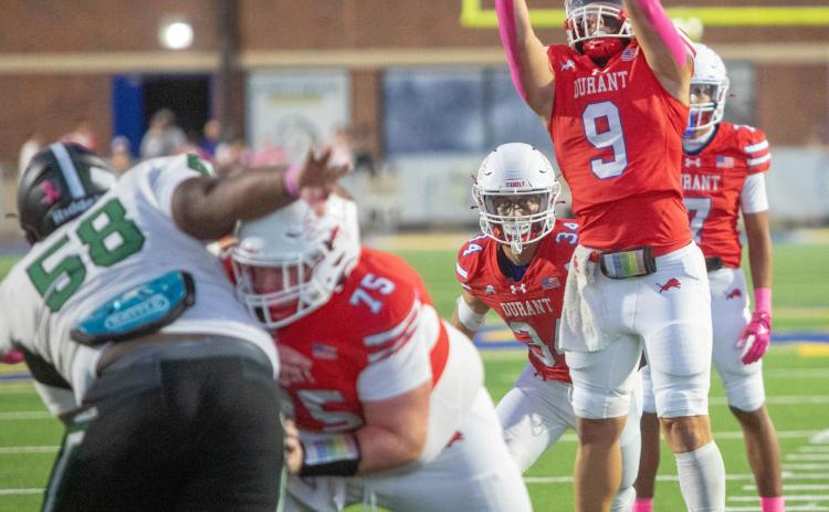 Durant quarterback Cole Robbins catches the ball in the game with Tulsa Edison. Matt Swearengin | Durant Democrat