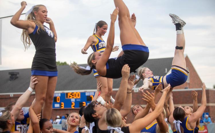 Southeastern cheerleaders perform at last Saturday’s football game with Southwestern at Paul Laird Field.