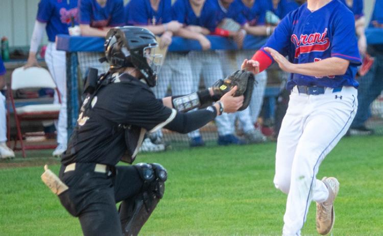 Lion Lucas McClure runs to home plate during a recent game with McAlester. Matt Swearengin | Durant Democrat