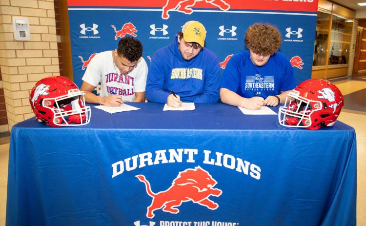 Durant Lions Kaydon Mimms, Tucker Dry and Carson Allivand signed scholarships last week to play football in college. Allivand and Dry will attend Southeastern while Mimms is heading to the University of Central Oklahoma. Matt Swearengin | Durant Democrat