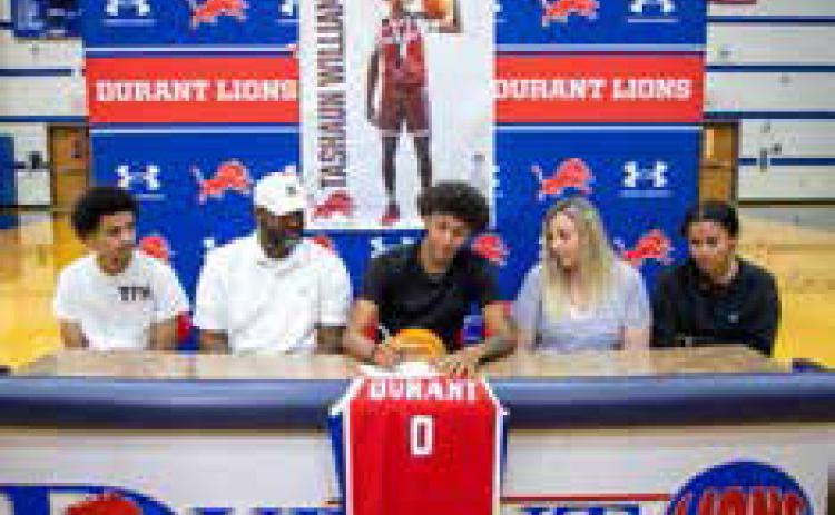 Durant graduate Tashaun Williams signed a scholarship offer from the College for International Studies in Madrid, Spain, where he will be playing basketball. From left, Tyrese Williams, Tyson Williams, Tashaun Williams, Misty Williams and Tierra Williams. Matt Swearengin | Durant Democrat