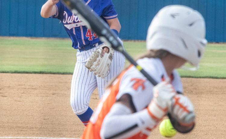 Lady Lion pitcher Emma Sherrer fires the ball at a batter. Matt Swearengin | Durant Democrat