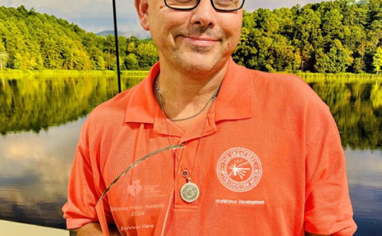 Craig Northcutt proudly holds his Stroke Hero Award trophy. Photo provided | Choctaw Nation