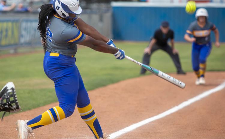 SE softball player India McMurray swings at the ball during a recent game with Arkansas Tech. Matt Swearengin | Durant Democrat
