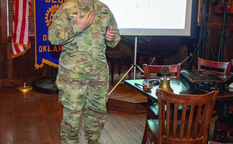 Oklahoma National Guard Capt. Eric Langley speaks to the Durant Rotary Club about his experiences when the guard assisted with security during the inauguration of President Donald Trump in January. Matt Swearengin | Durant Democrat