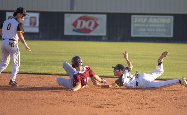 Colbert Leopard Hudson Brigman slides to second base and also shown are Caddo Bruins Boen Proctor and Jake McKay. Matt Swearengin | Durant Democrat