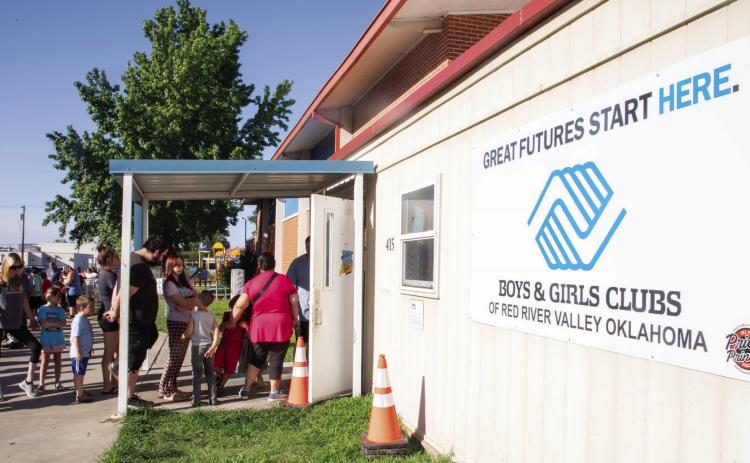 Matt Swearengin | Durant Democrat People were lined up out the door at the Boys &amp; Girls Club Saturday morning for the Bryan County Turning Point’s Coalition’s Back to School Bash where backpacks filled with school supplies were given to area children.