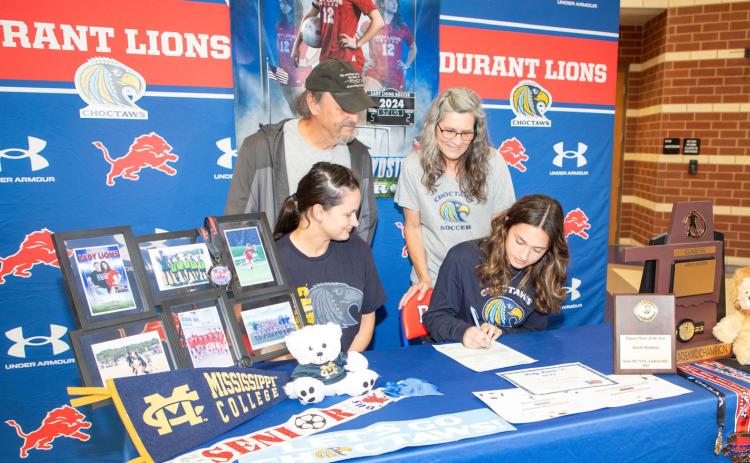 Durant Lady Lion soccer player Karah Boydstun signed to play soccer at Mississippi College. On the left is Boydstun’s sister, Katie Williams, who also is the Lady Lions soccer head coach. In back are Boydstun’s father, Harry Boydstun and mother Janice Boydstun. Matt Swearengin | Durant Democrat