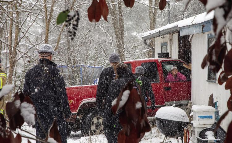 A pickup crashed into a house during the snow Jan. 9 when the driver lost control and the pickup slid o_ Robinson Street. Matt Swearengin | Durant Democrat