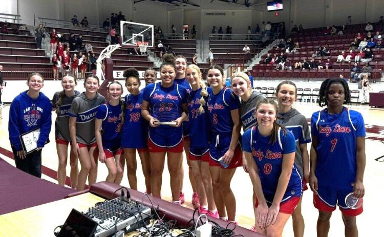 Durant Lady Lions pose after defeating Ada in the Annual East Central Classic last week. The team placed third in the tournament. Jim Reagan | KLBC