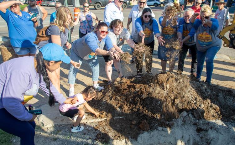 A time capsule to be opened in 2074 was buried June 14 in front of the Big Peanut at Durant City Hall. 