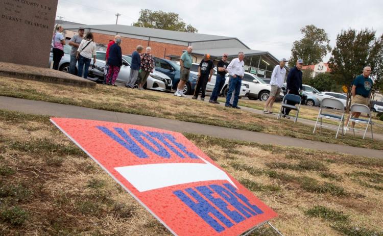 Residents wait in line Oct. 30 for early voting at the Bryan County Courthouse. 