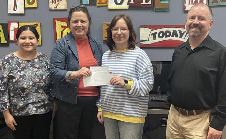 From left, Maria Gonzales, Assistant Director, Collegiate TRIO Programs; Darla Ellett, Executive Director, Post-Secondary TRIO Programs; Torrie Taylor; and Cameron Coley, Tutor Coordinator/Academic Counselor. Photo provided