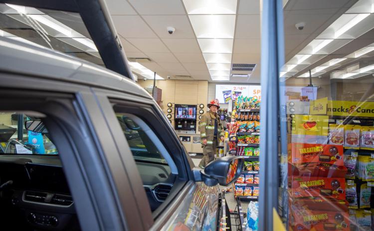 Car crashes into front doors of newly remodeled Love’s