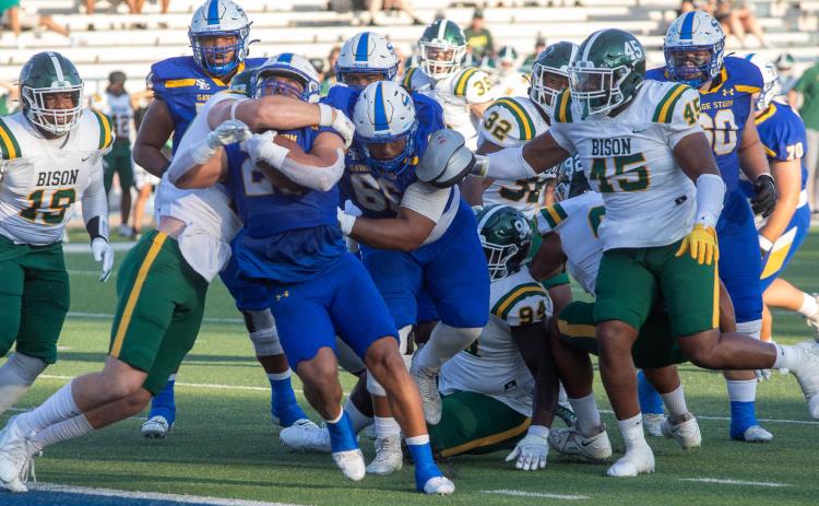 Savage Storm player DJ Brown is about to score a touchdown in last Saturday’s home game with Oklahoma Baptist. Matt Swearengin | Durant Democrat