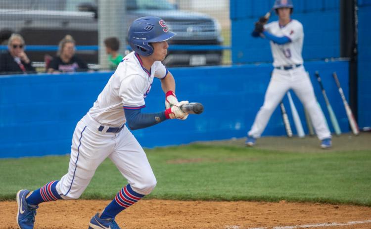 Silo Rebel Zane Sander prepares to bunt the ball. Matt Swearengin | Durant Democrat