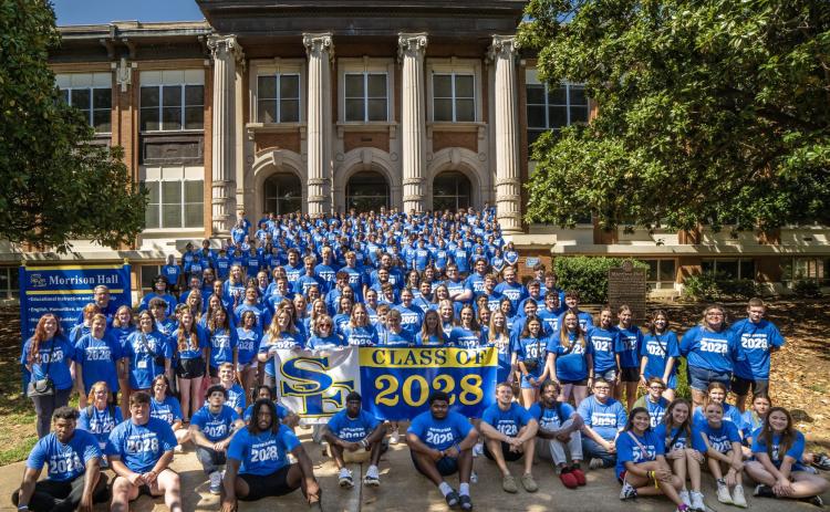 The Southeastern Oklahoma State University Class of 2028 gathers on the steps of Morrison Hall during the annual Freshman Convocation. Dan Hoke | SE