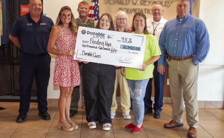 Feeding Hope receives funds from blood drive