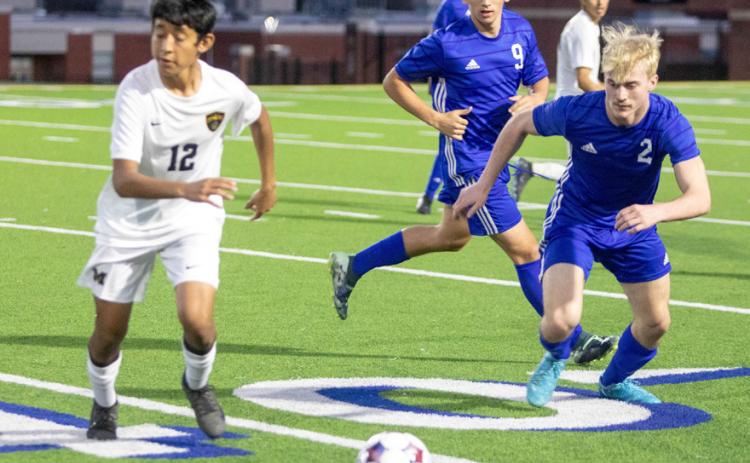 Durant Lions Konnor Shenas and Aiden Polk are shown in a recent game with Madill. Matt Swearengin | Durant Democrat