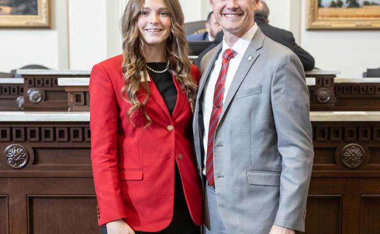 House Page Maddie Mueller stands with Rep. Cody Maynard on the House floor. Photo provided