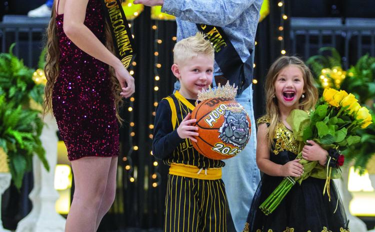 Calera High School Homecoming King and Queen, Darren Johnson and Chloe Damron, were announced before the basketball games Feb. 7. Early childhood attendants are Nixon Storts and Nataleigh Adams. Matt Swearengin | Durant Democrat