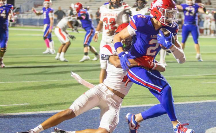 Lion Ryder Jones scores a touchdown during the game with Tulsa East Central. Matt Swearengin | Durant Democrat