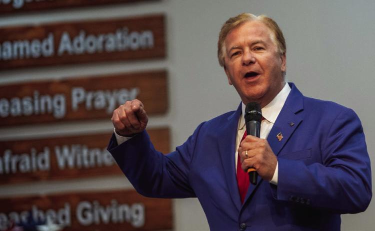 Mark McCloskey speaks at Fairview Baptist Church during a recent meeting of the Bryan County chapter of the Oklahoma Second Amendment Association. McCloskey confronted protesters with an AR-15 when they were walking through his St. Louis neighborhood in 2020. Matt Swearengin | Durant Democrat