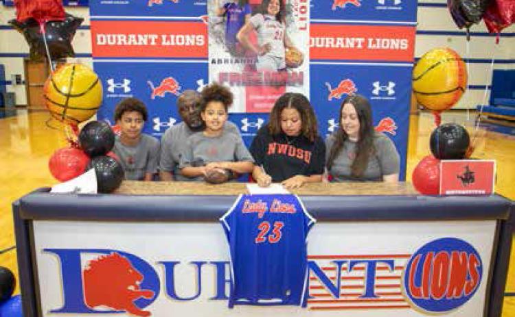Lady Lion Abrianna Freeman signed with Northwestern Oklahoma State University. From left, Antonio Freeman Jr., Antonio Freeman, Avianna Freeman, Abrianna Freeman and Taschona Freeman. Matt Swearengin | Durant Democrat