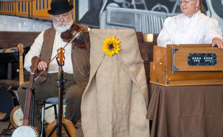 Wayne and Brenda Cantwell performed “Songs of the Open Prairie,” last month, which is 19th century American and Celtic songs at Three Valley Museum and they also shared the history of the instruments they play. Matt Swearengin | Durant Democrat