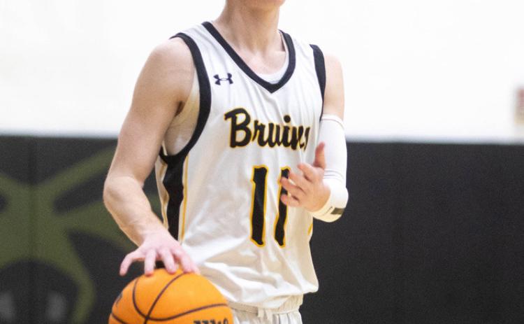 Caddo boys win area, Lady Bruins back to state