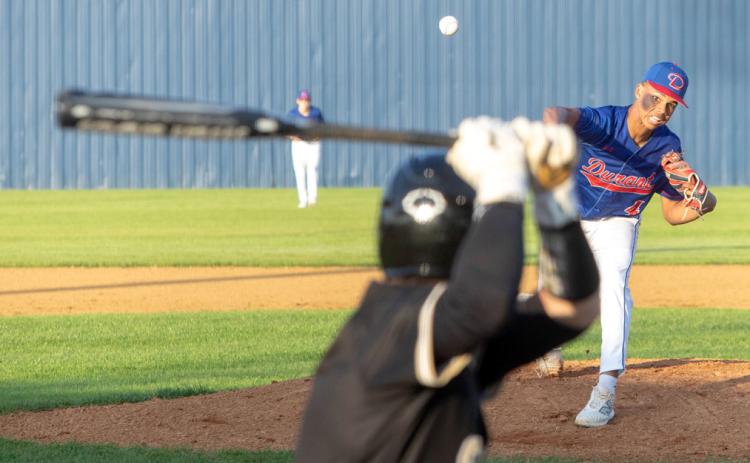 Durant Lion Holdan Robinson throws a pitch to a McAlester batter. Matt Swearengin | Durant Democrat